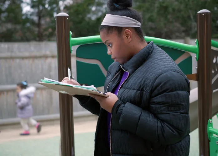 Teacher and clipboard